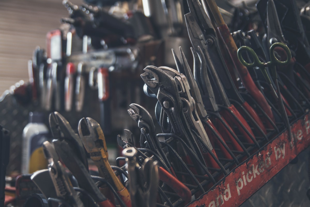 A plumbing and heating engineer's tools laid out ready for work