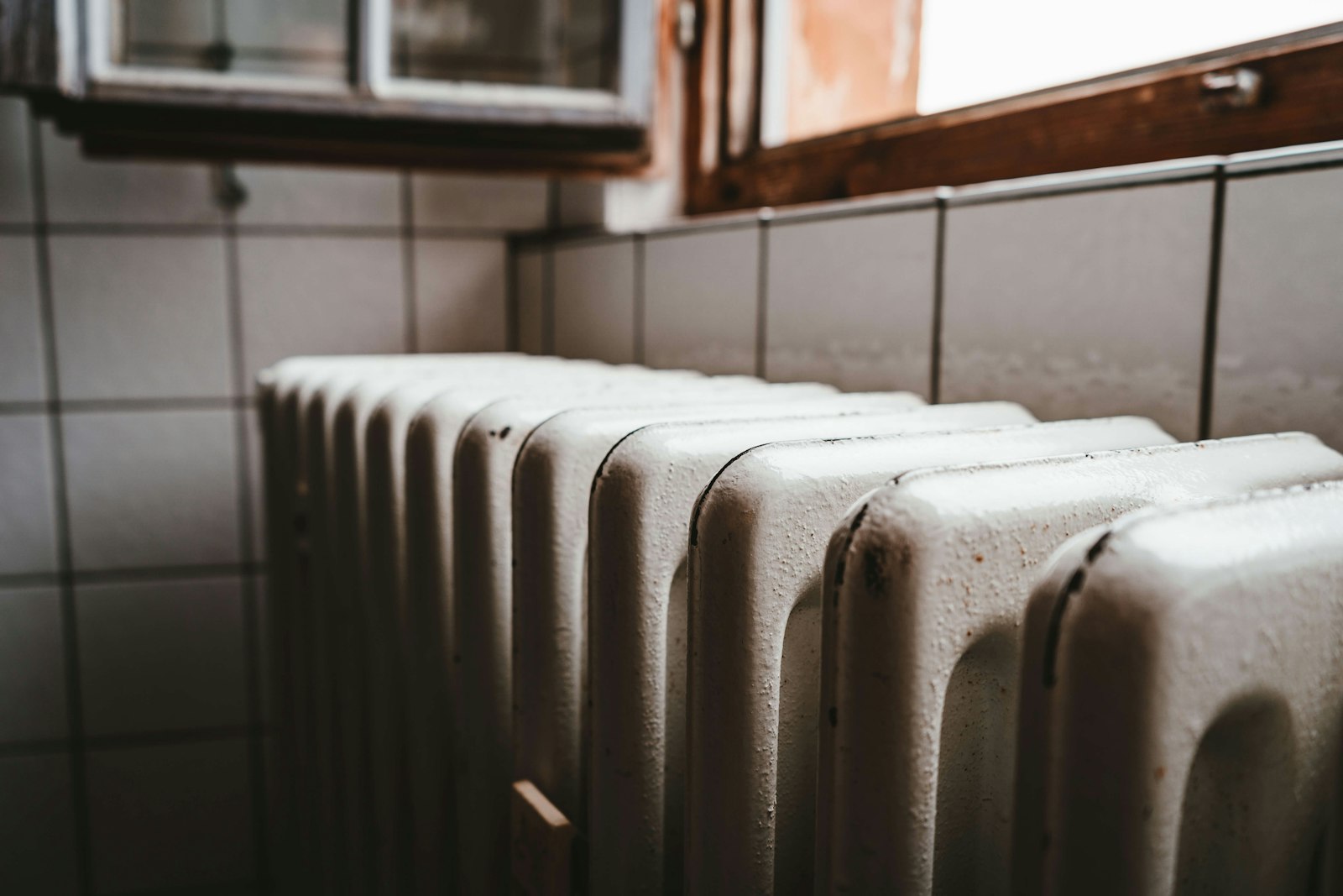 New central heating radiator fitted to a wall