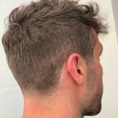 Textured crop haircut with tapered back and sides