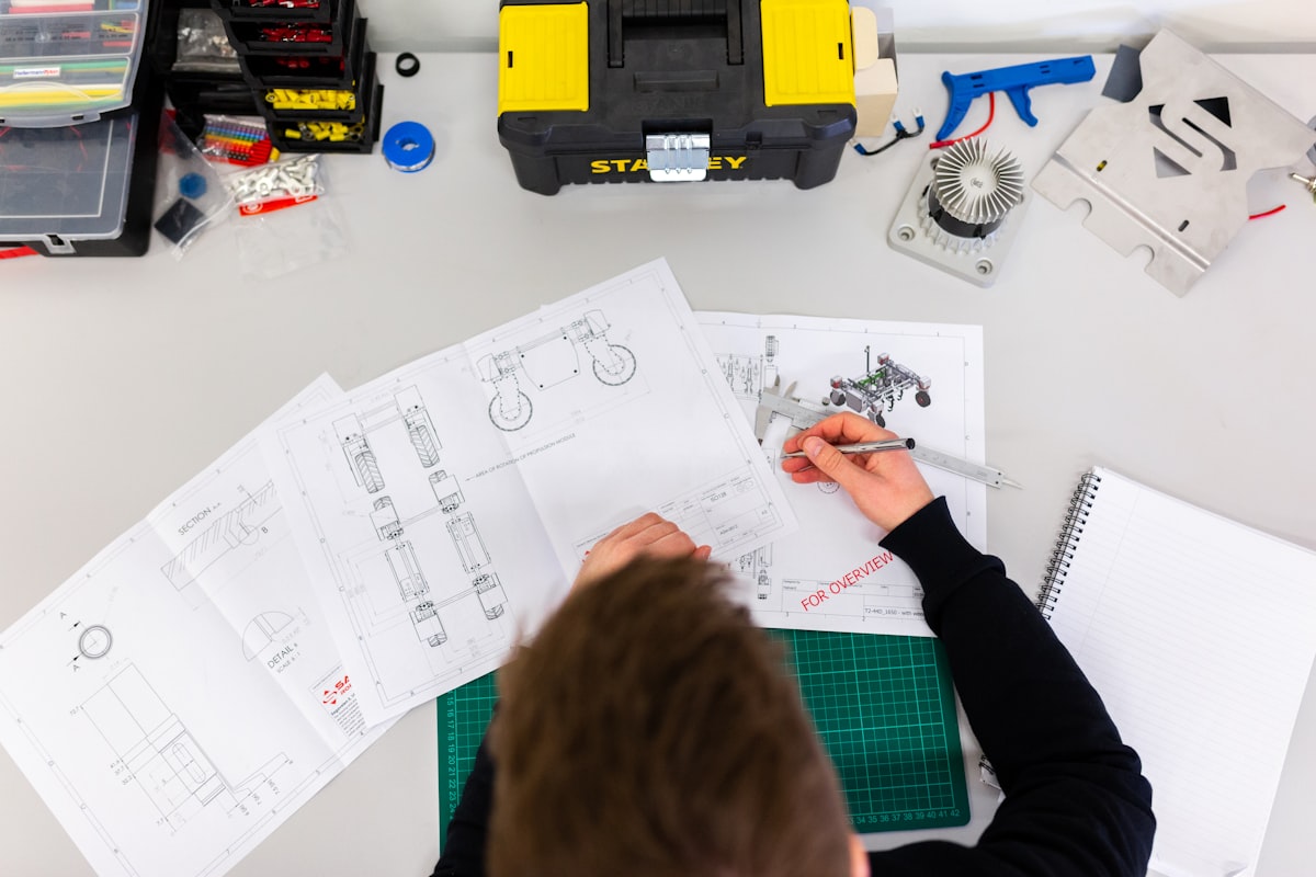 Heating engineer's tools laid out while planning a job