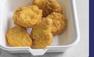 Chicken nuggets in a takeaway tray