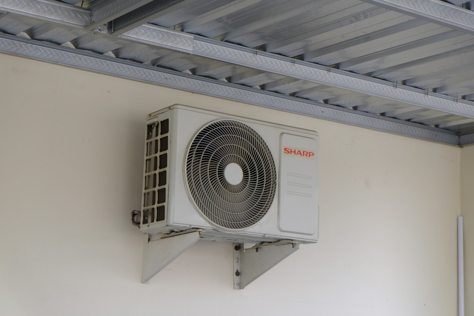 Wall-mounted air-conditioning unit installed by J W Roberts