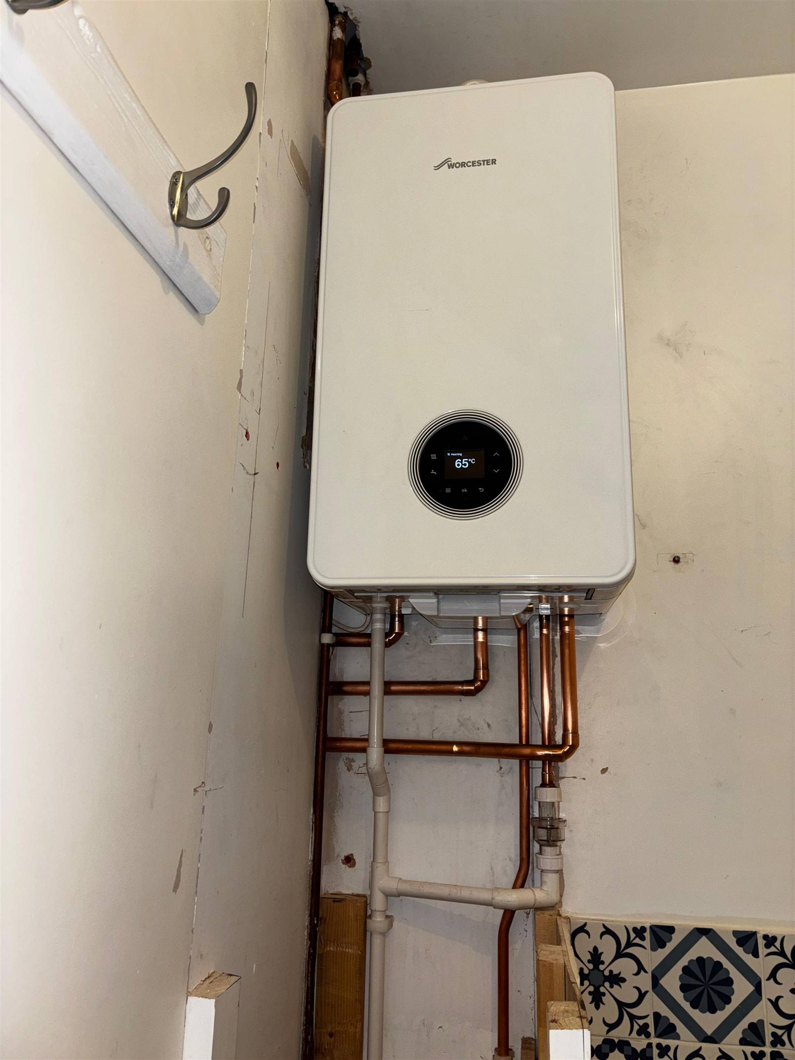 Neatly finished Worcester Bosch boiler installation