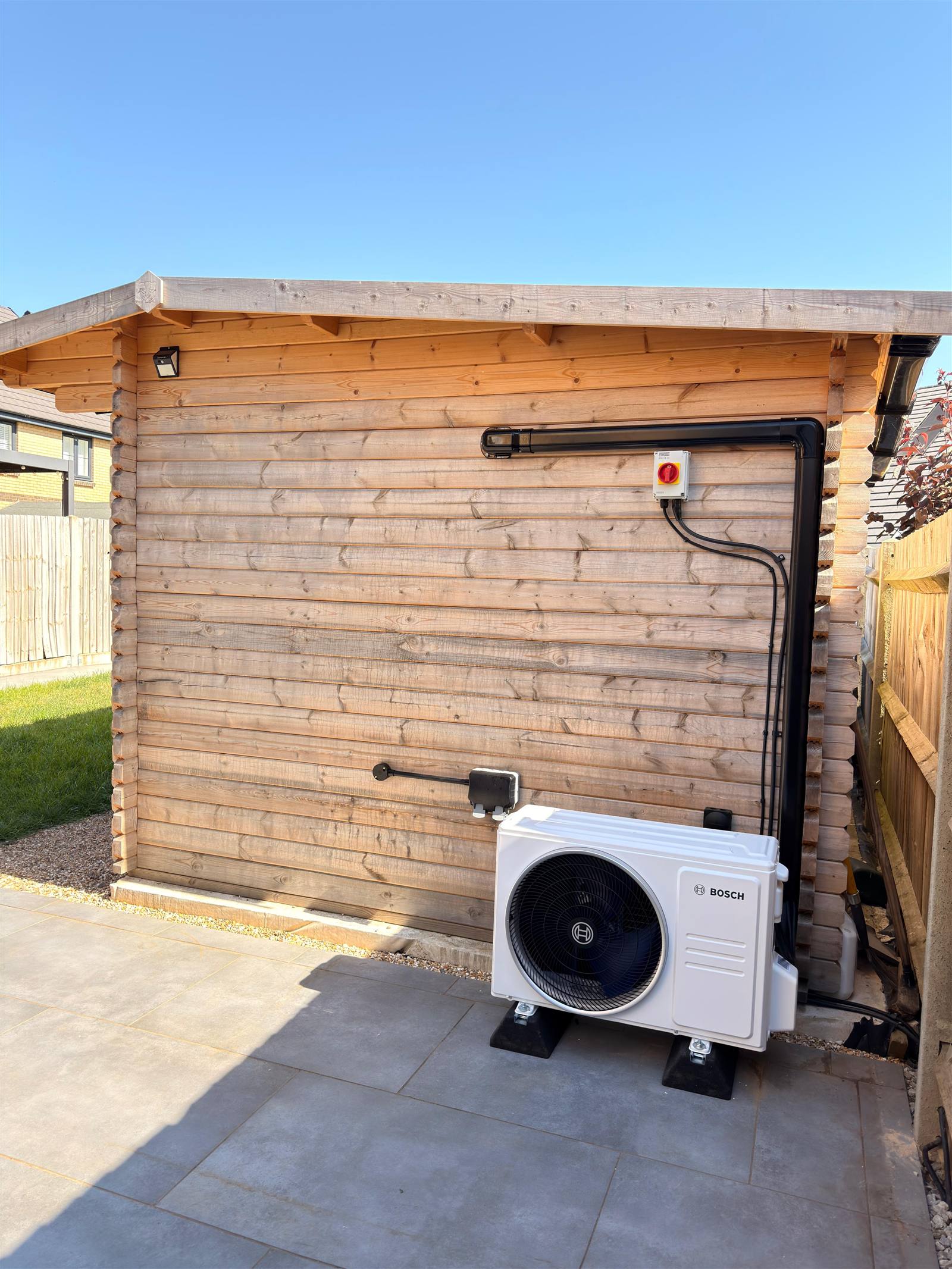 Bosch air source heat pump installed outside a home
