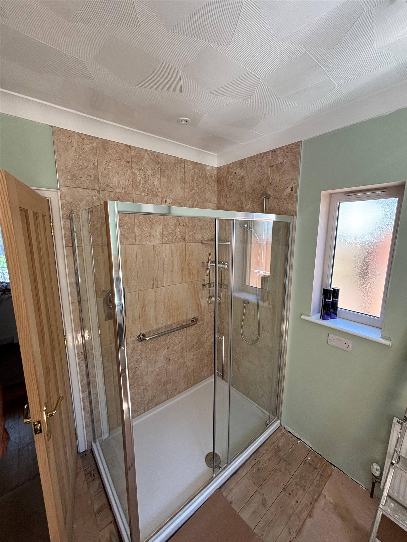 New shower enclosure with grab rail