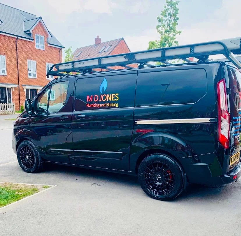 The M D Jones Plumbing and Heating branded van