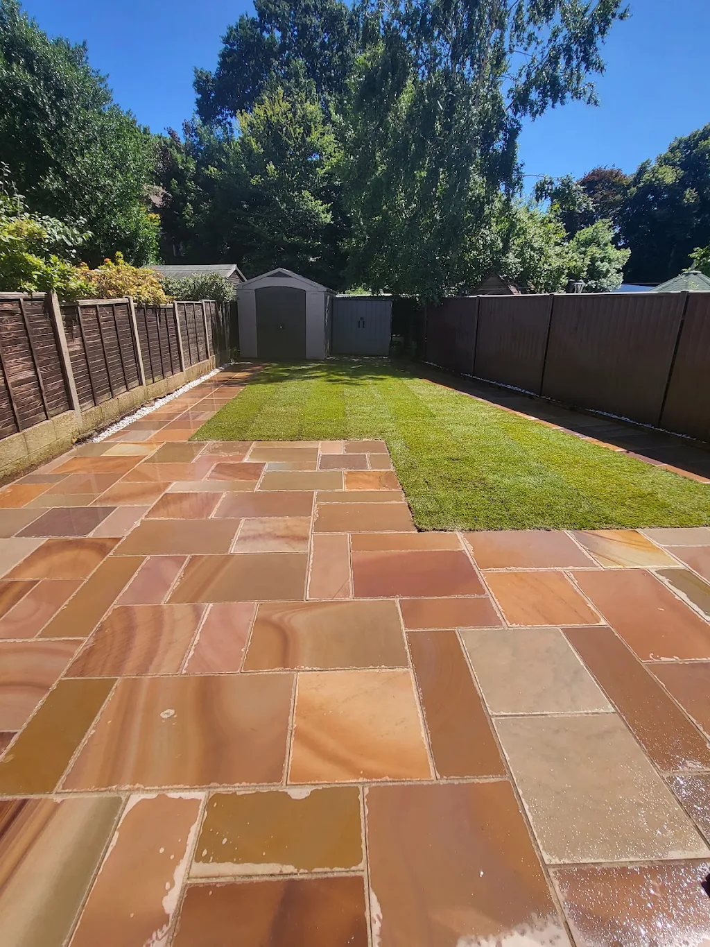 Neatly finished Southampton garden with sandstone patio and new lawn