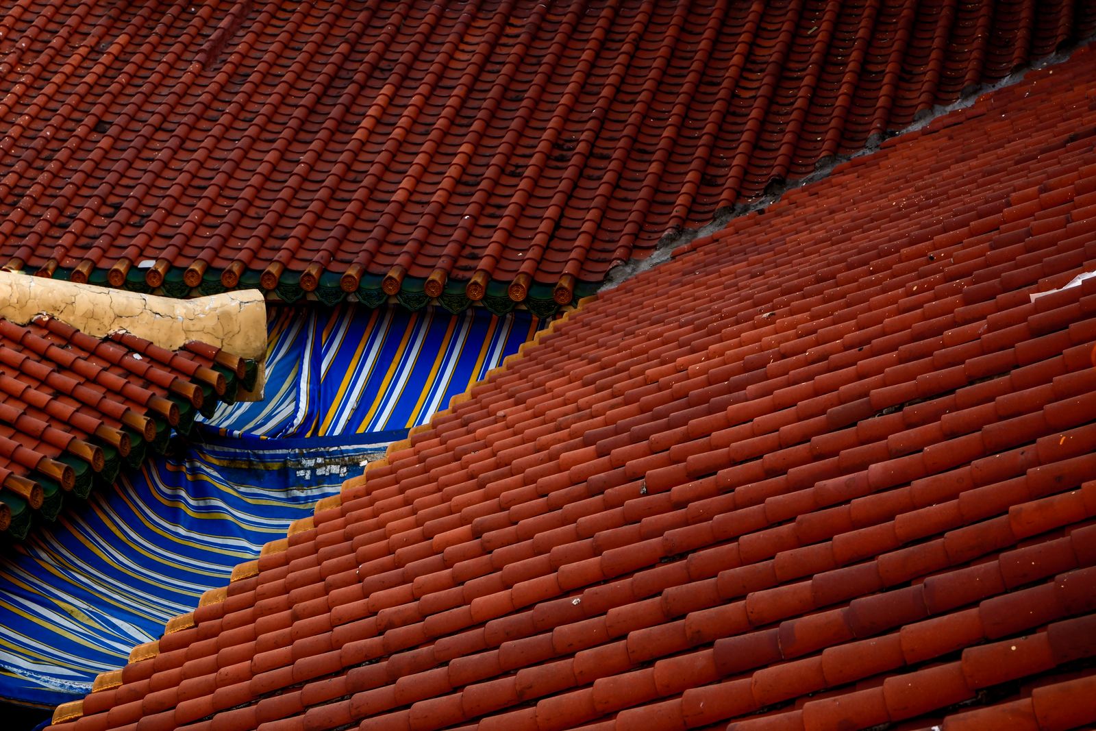 Traditional red-tiled rooftops on a terrace of houses