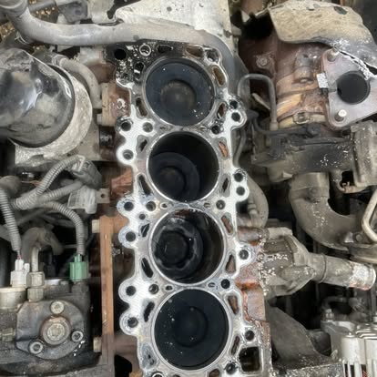 Cylinder head removed from an engine during an SC Services repair job