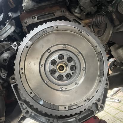 Flywheel assembly close-up during a clutch replacement job