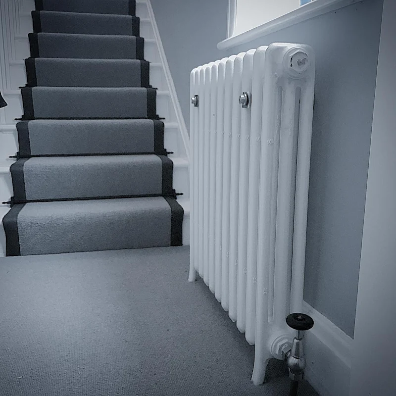 Traditional column radiator installed in a hallway