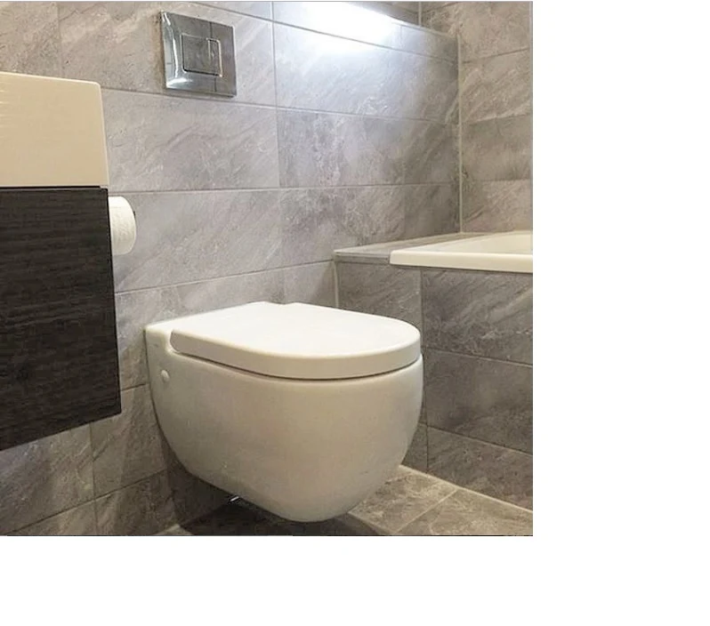 Wall-hung toilet installed in a tiled bathroom