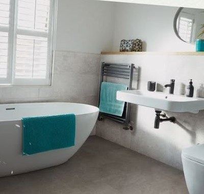 Stone-effect tiled floor in a family bathroom