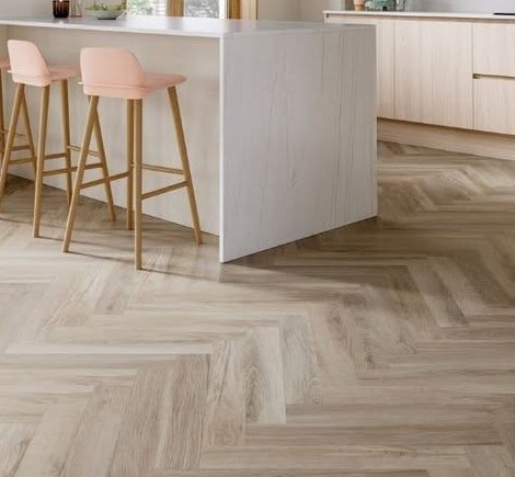 Herringbone luxury vinyl flooring in a modern kitchen
