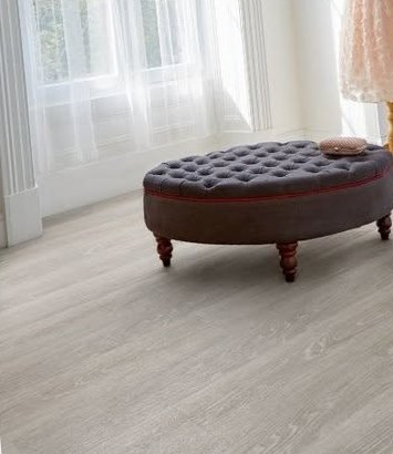 Grey plank luxury vinyl flooring in a living space