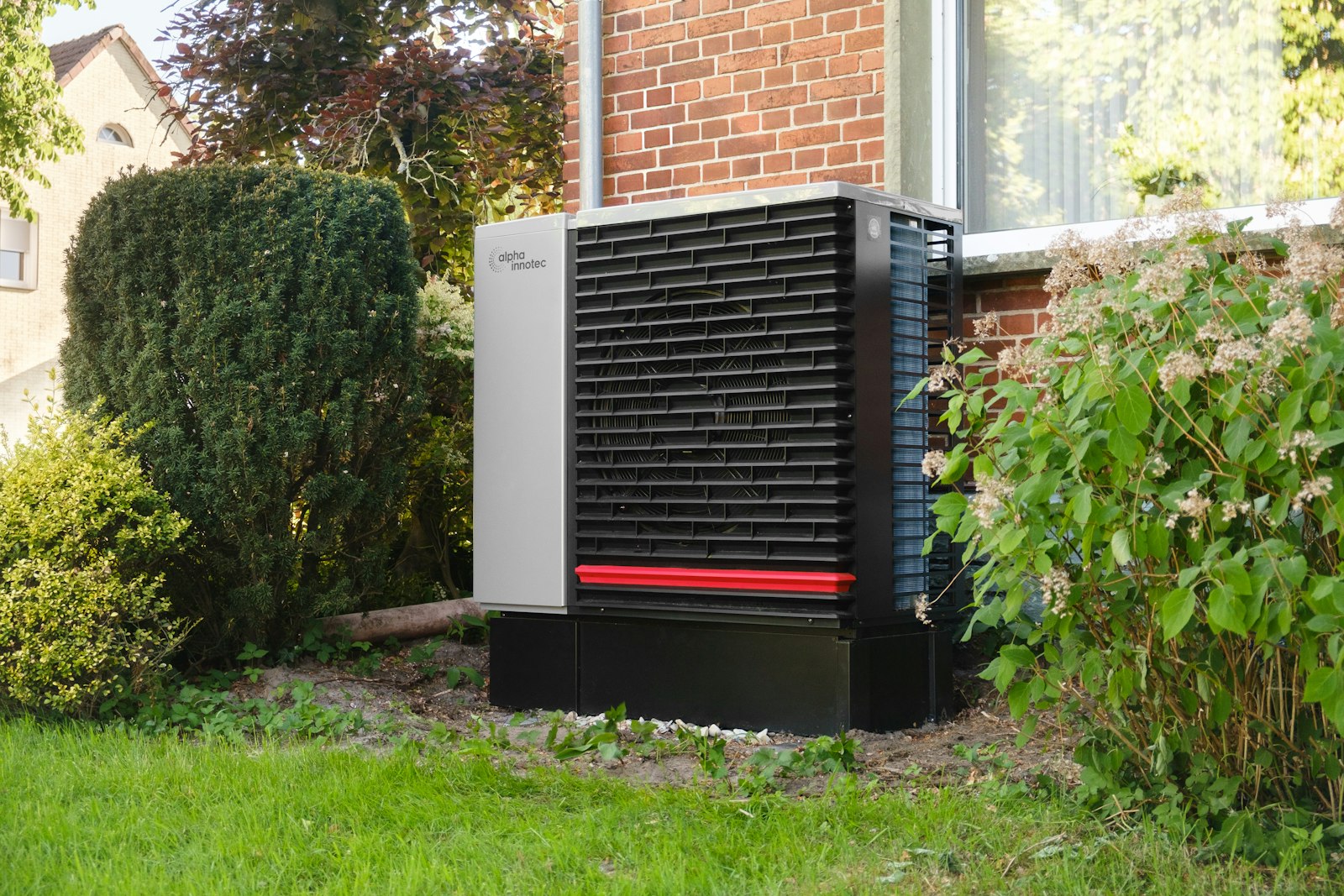 Air source heat pump installed in a garden